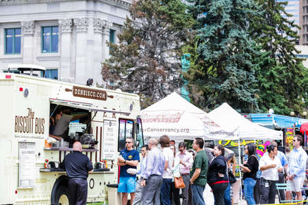 Denver, Colorado, USA-June 11, 2015.  Gathering of gourmet food trucks and carts in Downtown Denver Civic Center Park.のeditorial素材