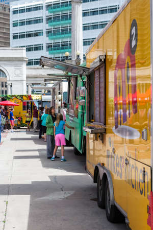 Denver, Colorado, USA-June 11, 2015.  Gathering of gourmet food trucks and carts in Downtown Denver Civic Center Park.のeditorial素材