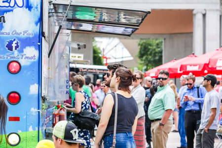 Denver, Colorado, USA-June 11, 2015.  Gathering of gourmet food trucks and carts in Downtown Denver Civic Center Park.のeditorial素材
