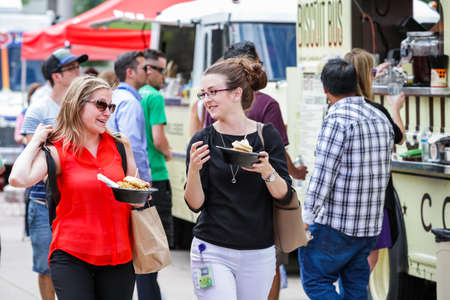 Denver, Colorado, USA-June 11, 2015.  Gathering of gourmet food trucks and carts in Downtown Denver Civic Center Park.のeditorial素材