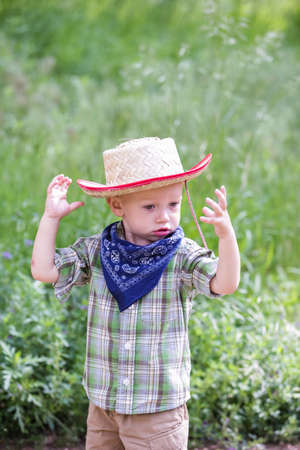 Toddlers having fun in the park for July Fourth.の写真素材