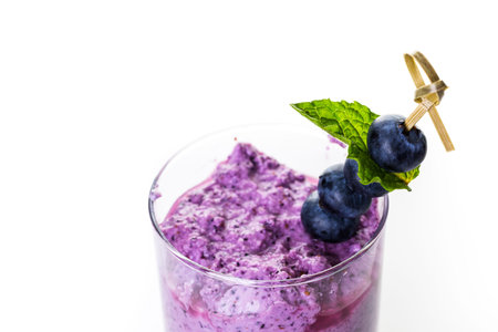 Blueberrie smoothie made with fresh organic blueberries and plain yogurt.の写真素材