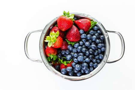 Colander with washed organic berries.の写真素材