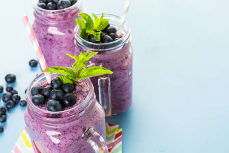 Blueberrie smoothie made with fresh organic blueberries and plain yogurt.の写真素材
