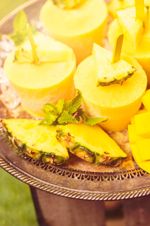 Homemade low calorie made with mando, pineapple and cocconut milk at the summe rpicnic.