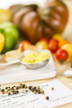 Ingredients to make roasted tomato soup with organic heirloom tomatoes.