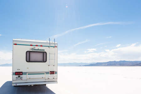 Bonneville, Utah, USA-August 5, 2015. Driving motorhome on Bonneville Salt Flats, Utah.のeditorial素材