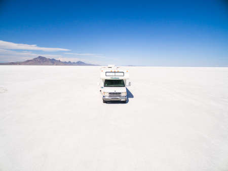 Bonneville, Utah, USA-August 5, 2015. Driving motorhome on Bonneville Salt Flats, Utah.のeditorial素材