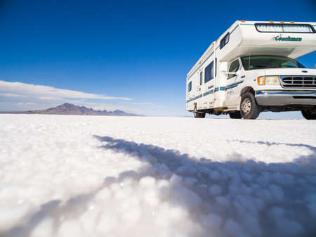 Bonneville, Utah, USA-August 5, 2015. Driving motorhome on Bonneville Salt Flats, Utah.のeditorial素材
