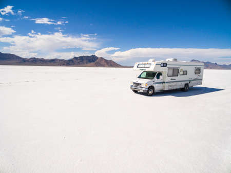 Bonneville, Utah, USA-August 5, 2015. Driving motorhome on Bonneville Salt Flats, Utah.のeditorial素材
