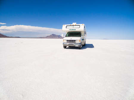 Bonneville, Utah, USA-August 5, 2015. Driving motorhome on Bonneville Salt Flats, Utah.のeditorial素材