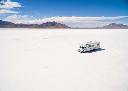 Bonneville, Utah, USA-August 5, 2015. Driving motorhome on Bonneville Salt Flats, Utah.のeditorial素材