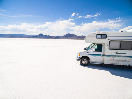 Bonneville, Utah, USA-August 5, 2015. Driving motorhome on Bonneville Salt Flats, Utah.