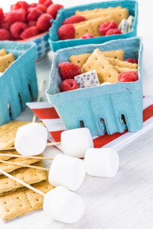 Smores with white chocolate and fresh raspberries.の写真素材