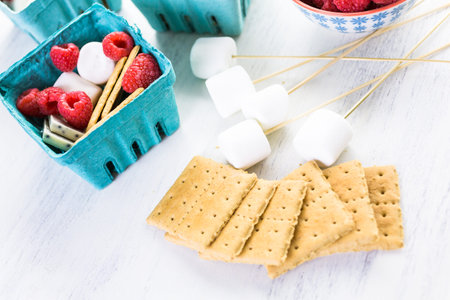 Smores with white chocolate and fresh raspberries.の写真素材