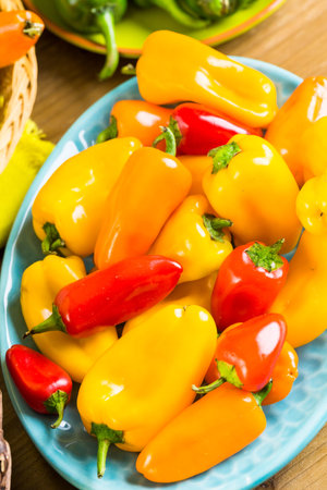 Variety of fresh organic peppers on the table.