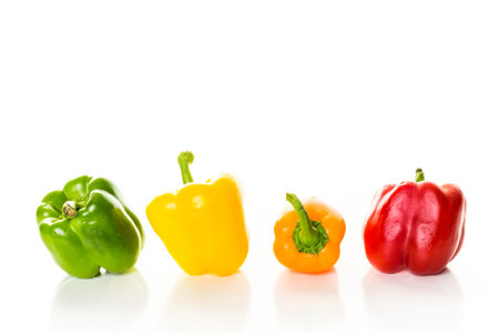 Bell peppers on a white background.の写真素材