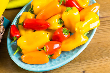 Variety of fresh organic peppers on the table.
