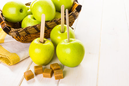 Apples ready to deeped in fresh caramel.の写真素材