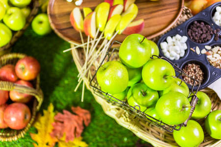 Autumn picnic with fresh caramel apple slices.の写真素材