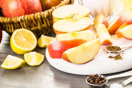 Ingredients for preparing homemade apple butter from organic apples.