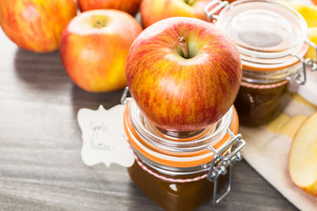 Homemade apple butter prepared from organic apples.の写真素材