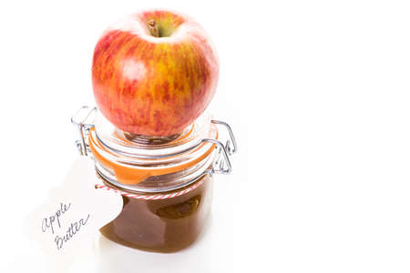 Homemade apple butter prepared from organic apples.の写真素材