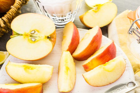 Ingredients for preparing homemade apple butter from organic apples.