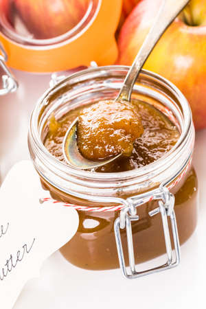 Homemade apple butter prepared from organic apples.の写真素材