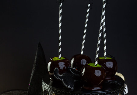 Homemade candy apples for Halloween party on the table.の写真素材