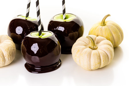 Homemade candy apples on a white backgeound.の写真素材