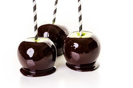 Homemade candy apples on a white backgeound.の写真素材