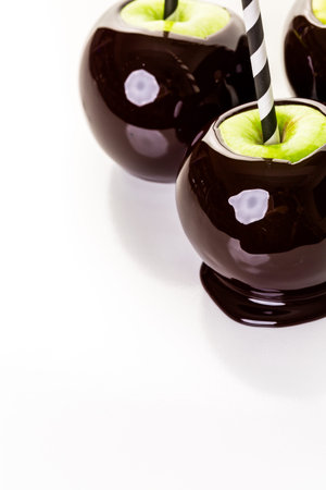 Homemade candy apples on a white backgeound.の写真素材