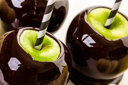 Homemade candy apples on a white backgeound.の写真素材