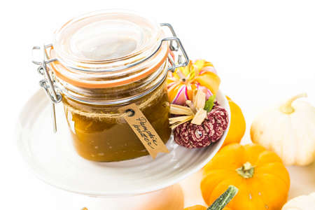 Homemade pumpkin butter made with organic pumpkins.の写真素材