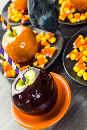 Handmade orange candy apples for Halloween.
