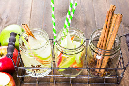 Infused apple water with cinnamon and anise.の写真素材