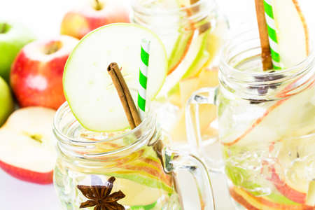 Infused apple water with cinnamon and anise.の写真素材
