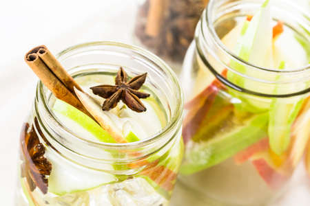 Infused apple water with cinnamon and anise.の写真素材