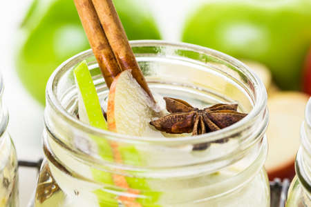 Infused apple water with cinnamon and anise.の写真素材