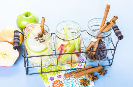 Infused apple water with cinnamon and anise.の写真素材