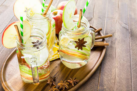 Infused apple water with cinnamon and anise.の写真素材
