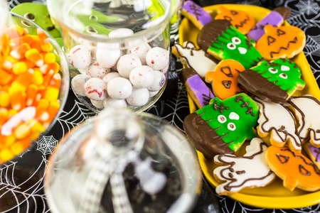 Variety of sweets prepared as Halloween treats.の写真素材