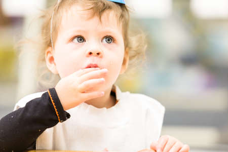 Toddler girl celebrating her second birthday.の写真素材