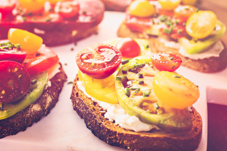 Tomato sandwich made with organic heirloom tomatoes.の写真素材