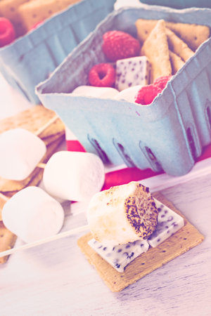 Smores with white chocolate and fresh raspberries.の写真素材