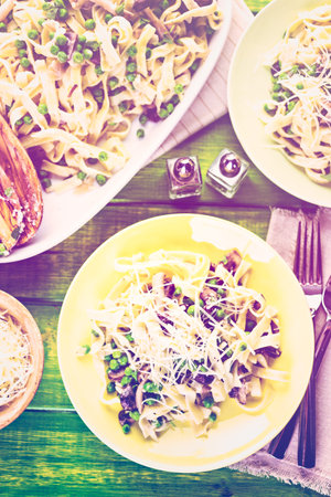 Fresh fettuccine with creamy mushroom sauce.の写真素材