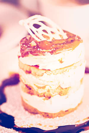 Fresh Italian Dulce de Leche with coffee on the table.の写真素材