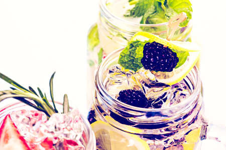 Fresh infused water made with organic ccitruses and berries.の写真素材