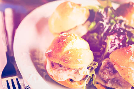 Fresh Italian meatball sliders on the table in Italian restaurant.の写真素材